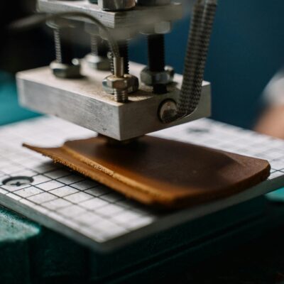 Close-Up Shot of a Person Making Leather